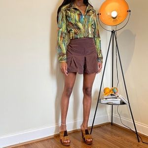 Brown lightweight corduroy pleated mini tennis skirt by eye shadow.